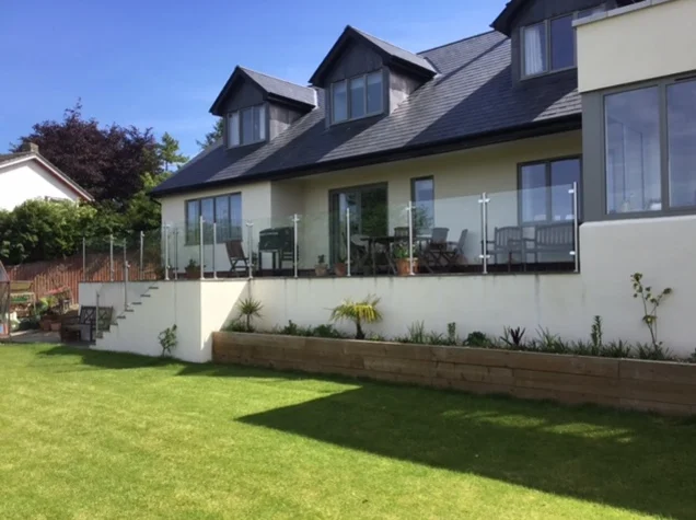 Stunning substantial home with a clear perspex balustrade on the veranda.